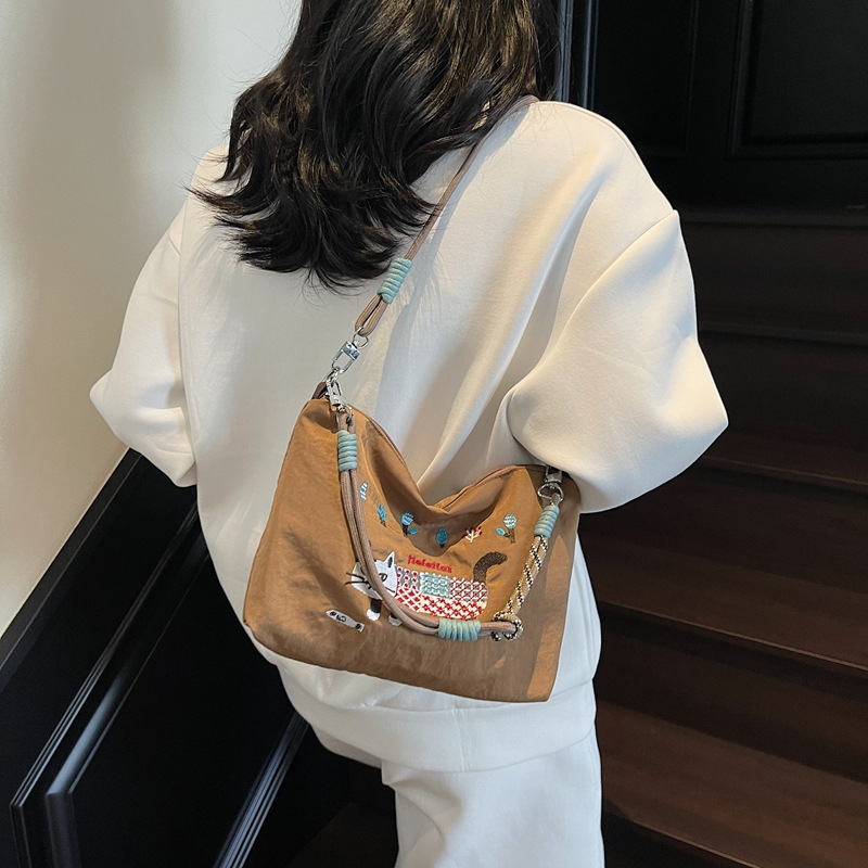 Large capacity spring and summer cat embroidery bag waterproof handheld crossbody bag shoulder bag shopping bag cartoon nylon bag women